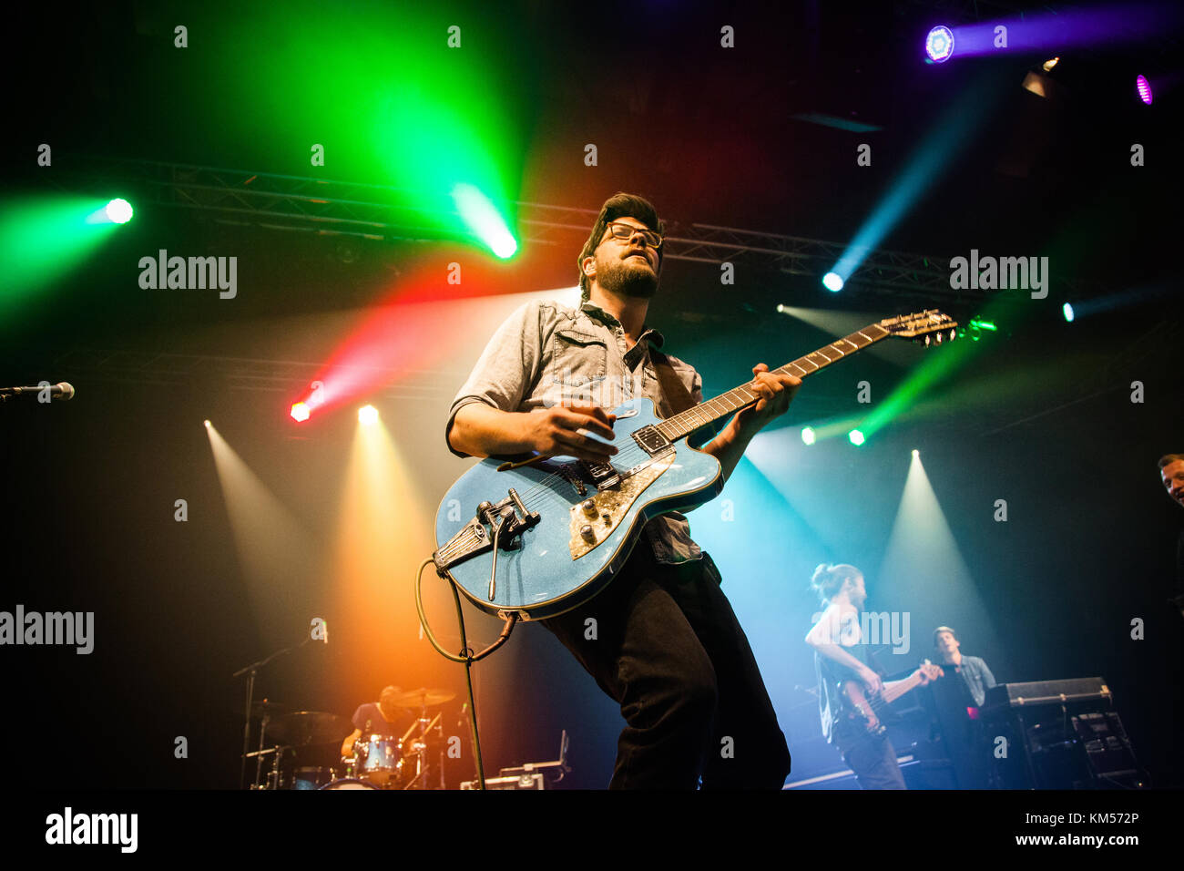 The German singer-songwriter and musician Joris Buchholz is best known just as Joris and here performs a live concert at the German music festival Traumzeit Festival 2015 in Duisburg. Here live band memner Wolfgang Morenz on guitar is pictired live on stage. Germany, 20/06 2015. Stock Photo