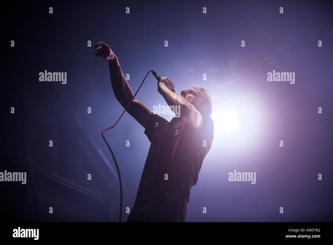 The German indie rock band Kraftklub combines different genres such as rock and rap and here performs a live concert at Palladium in Cologne. Here vocalist Felix Brummer is pictured live on stage. Germany, 26/02 2015. Stock Photo