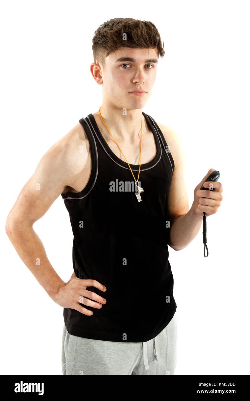 Teenage personal trainer holding a stop watch isolated on a white background Stock Photo