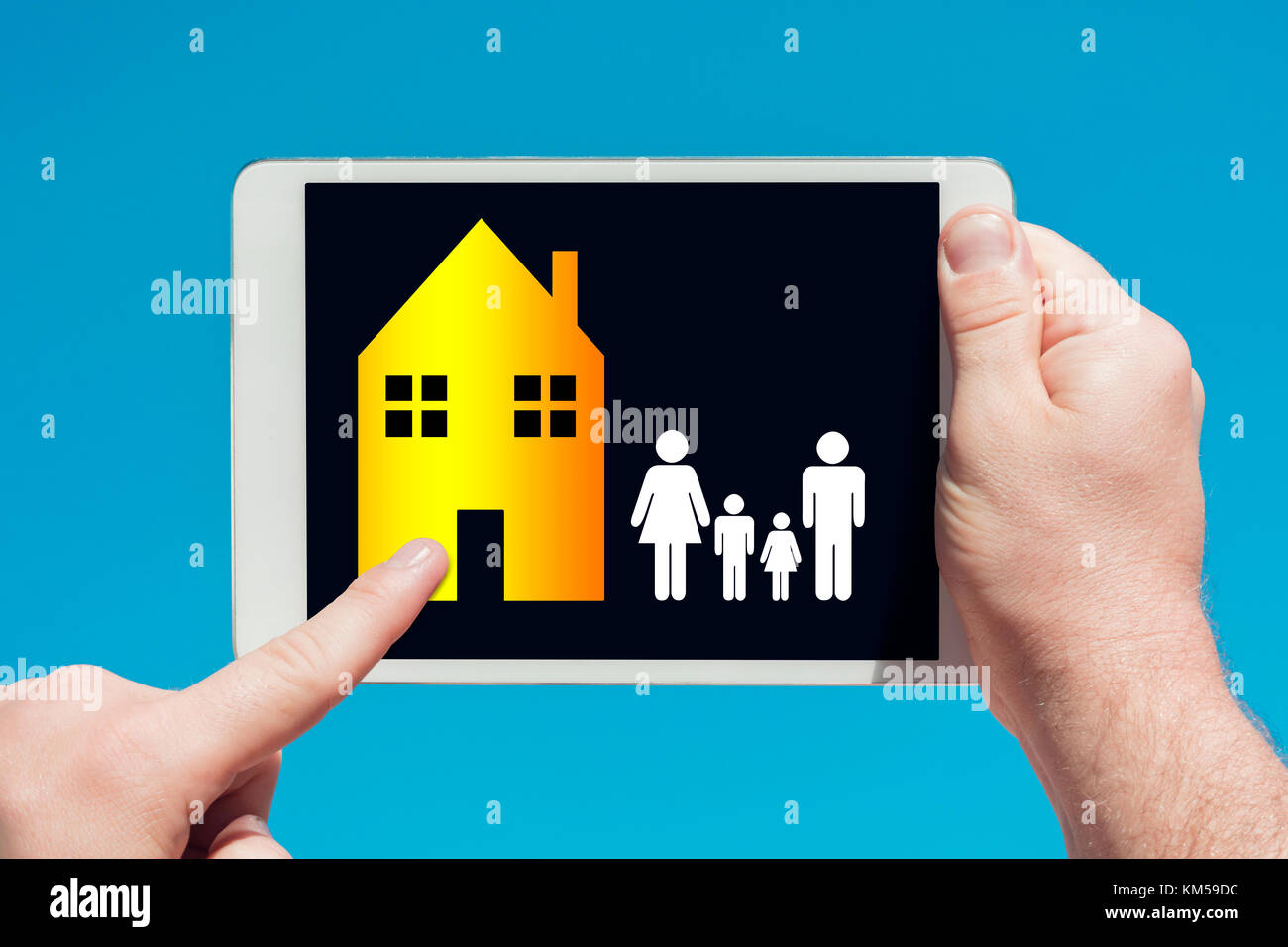 man-holding-a-tablet-device-showing-family-housing-concept-and-touching-KM59DC.jpg