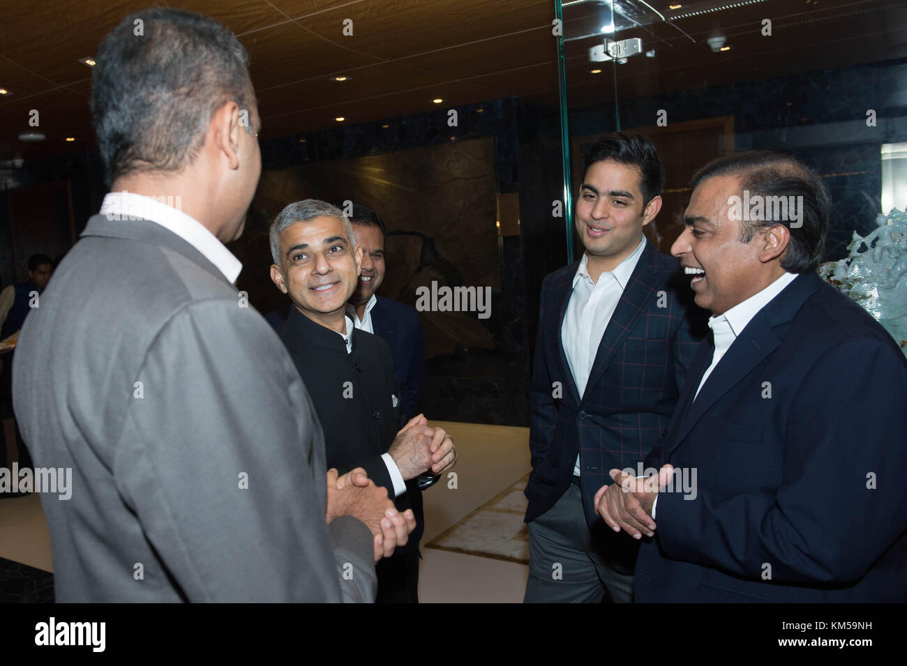 Mayor for London Sadiq Khan (second left) meets guests at a reception and dinner hosted by the billionaire businessman Mukesh Ambani (right) in Mumbai, India. The mayor is on a week long visit to the region to promote London and strengthen commercial and cultural ties with both Indian and Pakistani cities. Stock Photo