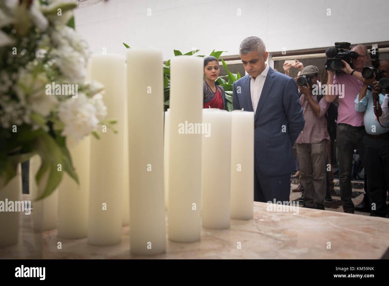 Mayor for London,Sadiq Khan pays his respects at a memorial in the Taj Mahal Palace Hotel in Mumbai for the victims of the 2008 terrorist attack on the hotel. The mayor is on a week long visit to the region to promote London and strengthen commercial and cultural ties with both Indian and Pakistani cities. Stock Photo