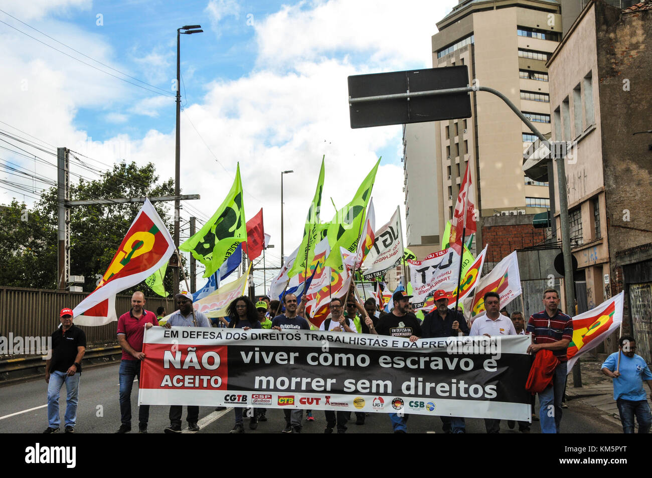 Porto Alegre, Brazil. 5th Dec, 2017. Central unions protest today, 05, at the airport Salgado Filho, in the city of Porto Alegre. The protest was the first of a series of acts organized for today in Rio Grande do Sul. This morning, at 8am, the demonstration began at the bus station in the capital of the state of Rio Grande do Sul. Around 5 o&#39;k, therehere were also acts at the Salgado Filho Airport. At this moment, trade unionists are now marching to the INSS headquarters. Demonstrators promise to mobilize all day in the city. (Photo: Omar de Oliveira/Fot Stock Photo