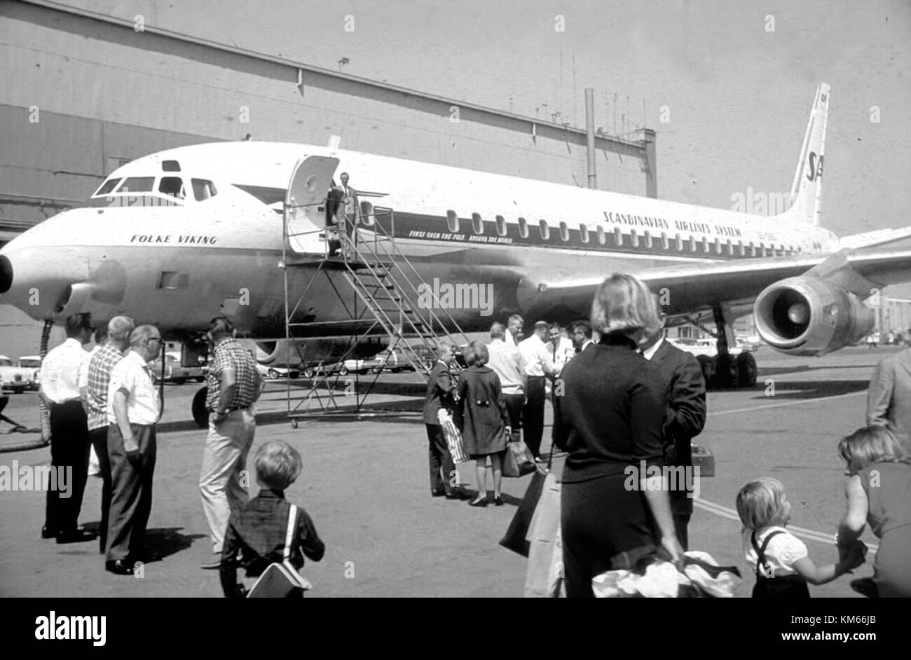 Photograph of a SAS DC-8 55 aircraft prior to its delivery, showcasing the aircraft's design and livery. The DC-8 55 model, developed by Douglas Aircraft Company, was widely used in commercial aviation during the 1960s and 1970s. Stock Photo