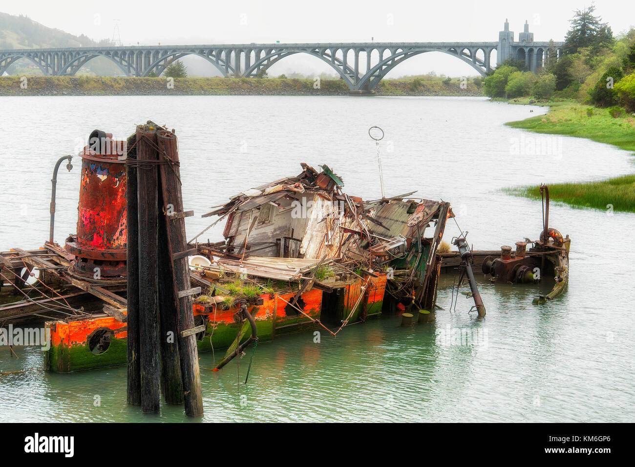 Remains of a steamer, Mary D. Hume, built in 1881 and retired in 1977 and sank in the Rogue River in 1985. Stock Photo