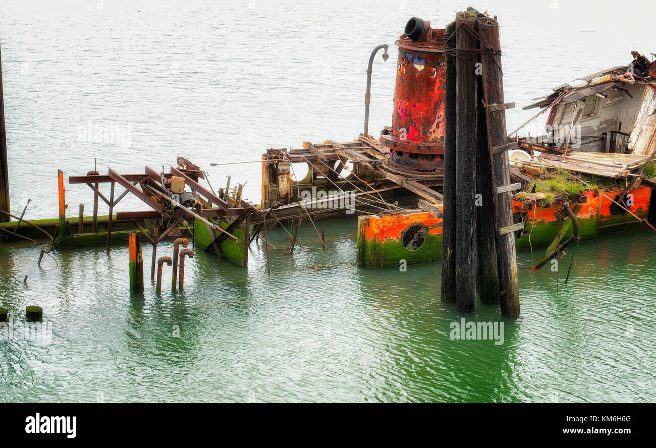 Remains of a steamer, Mary D. Hume, built in 1881 and retired in 1977 and sank in the Rogue River in 1985. Stock Photo