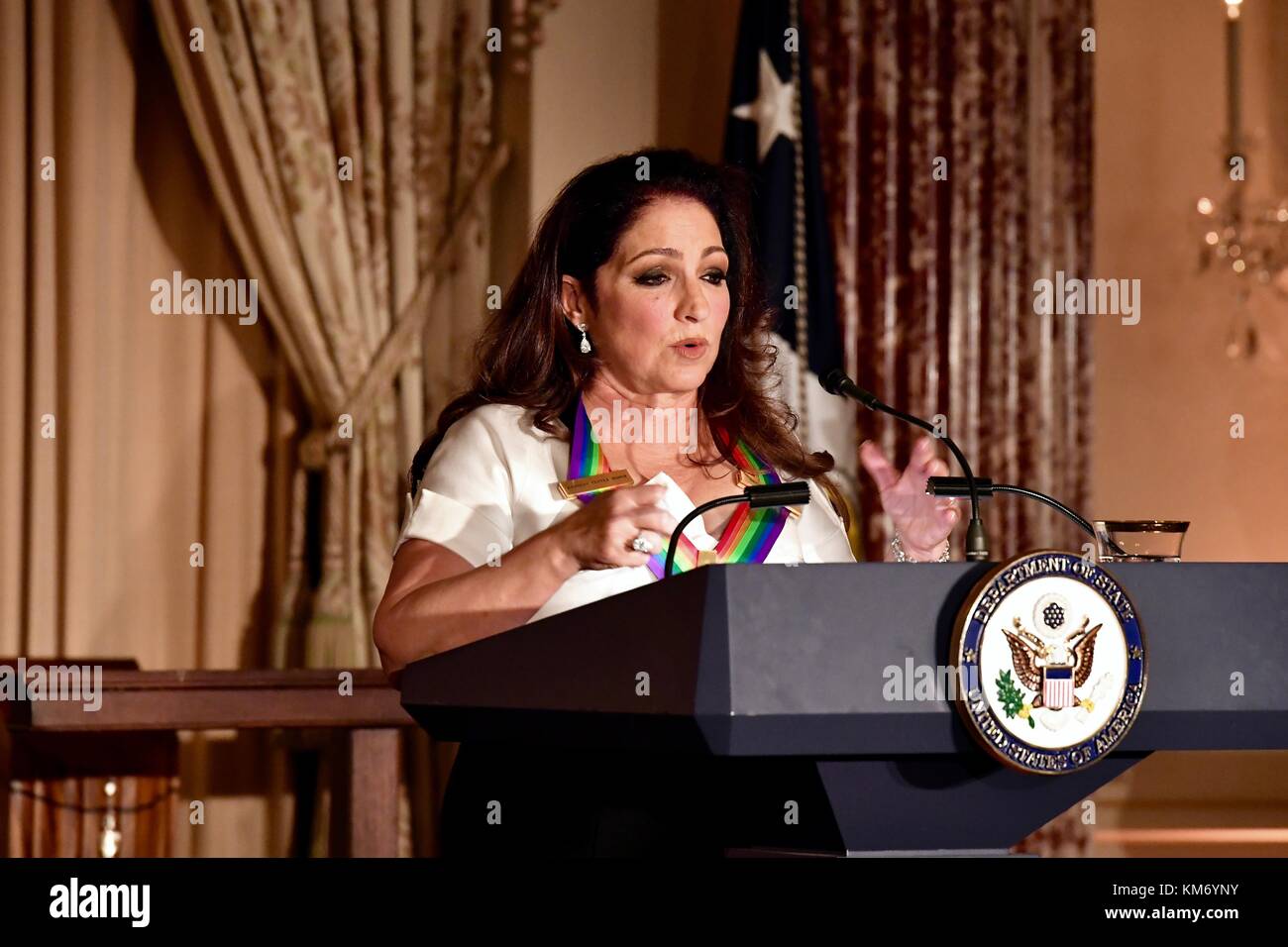 Singer Gloria Estefan, delivers remarks after receiving her Kennedy Center Honor medal during the gala dinner at the Department of State December 2, 2017 in Washington, DC. Stock Photo