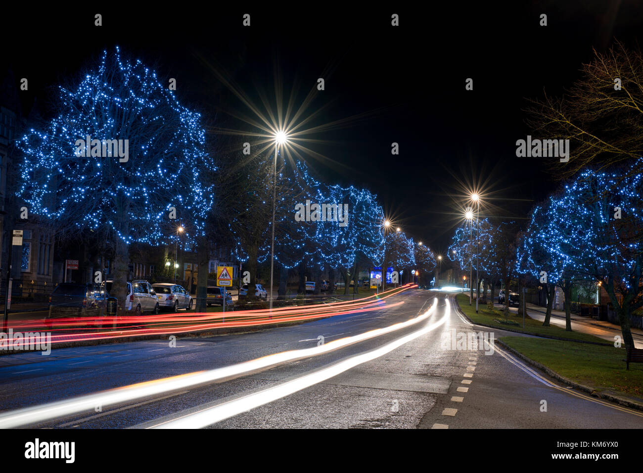 Christmas lights and car light trails in Brackley, Northamptonshire, England Stock Photo