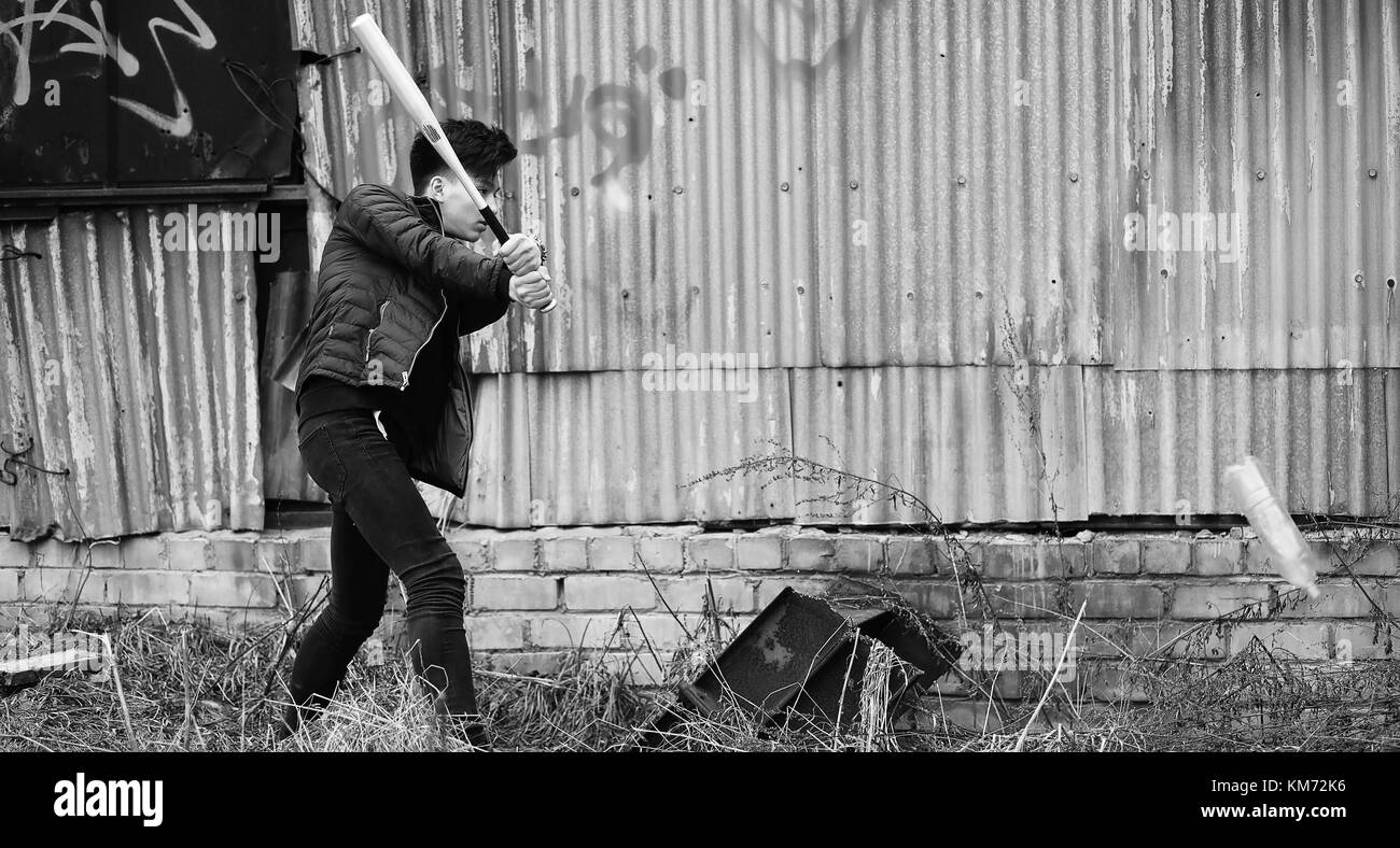 Black White photo of Asian young man outdoors posing Stock Photo - Alamy