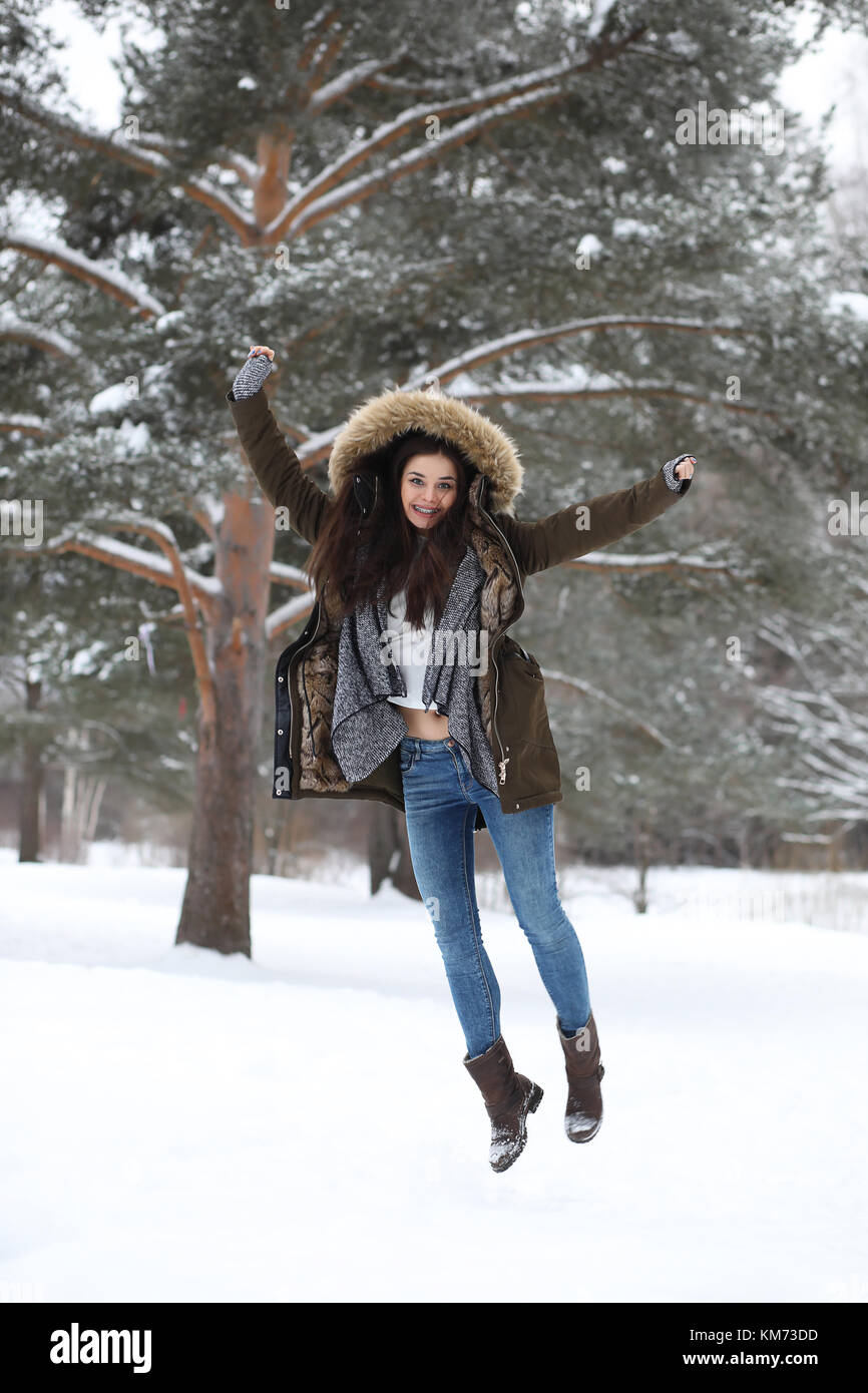 Beautiful girl in a beautiful winter park Stock Photo - Alamy