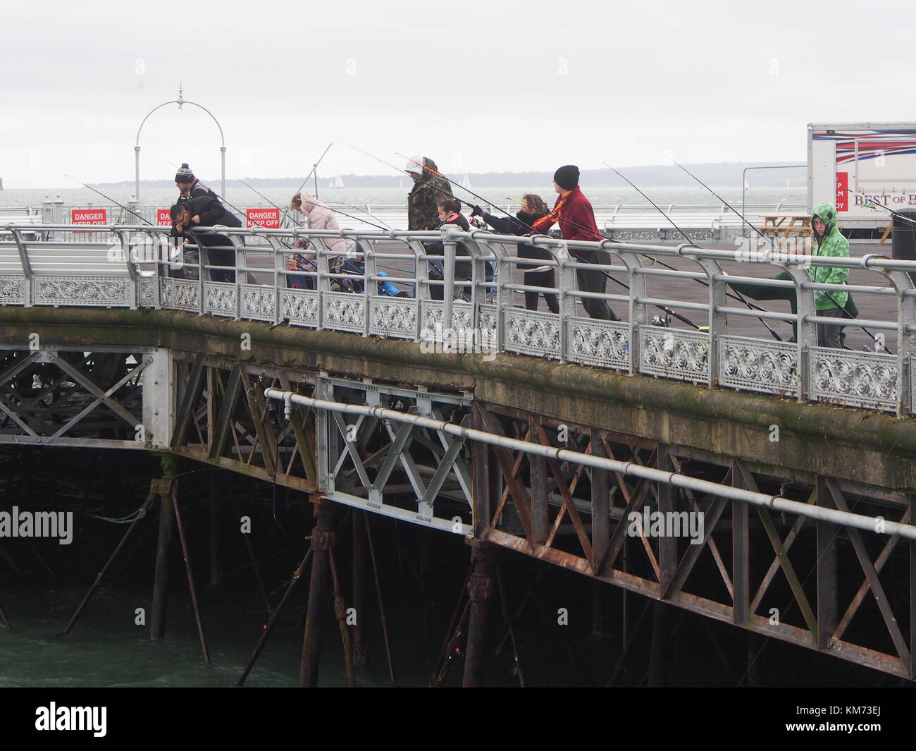 People fishing from South parade pier, Southsea, Portsmouth. Stock Photo