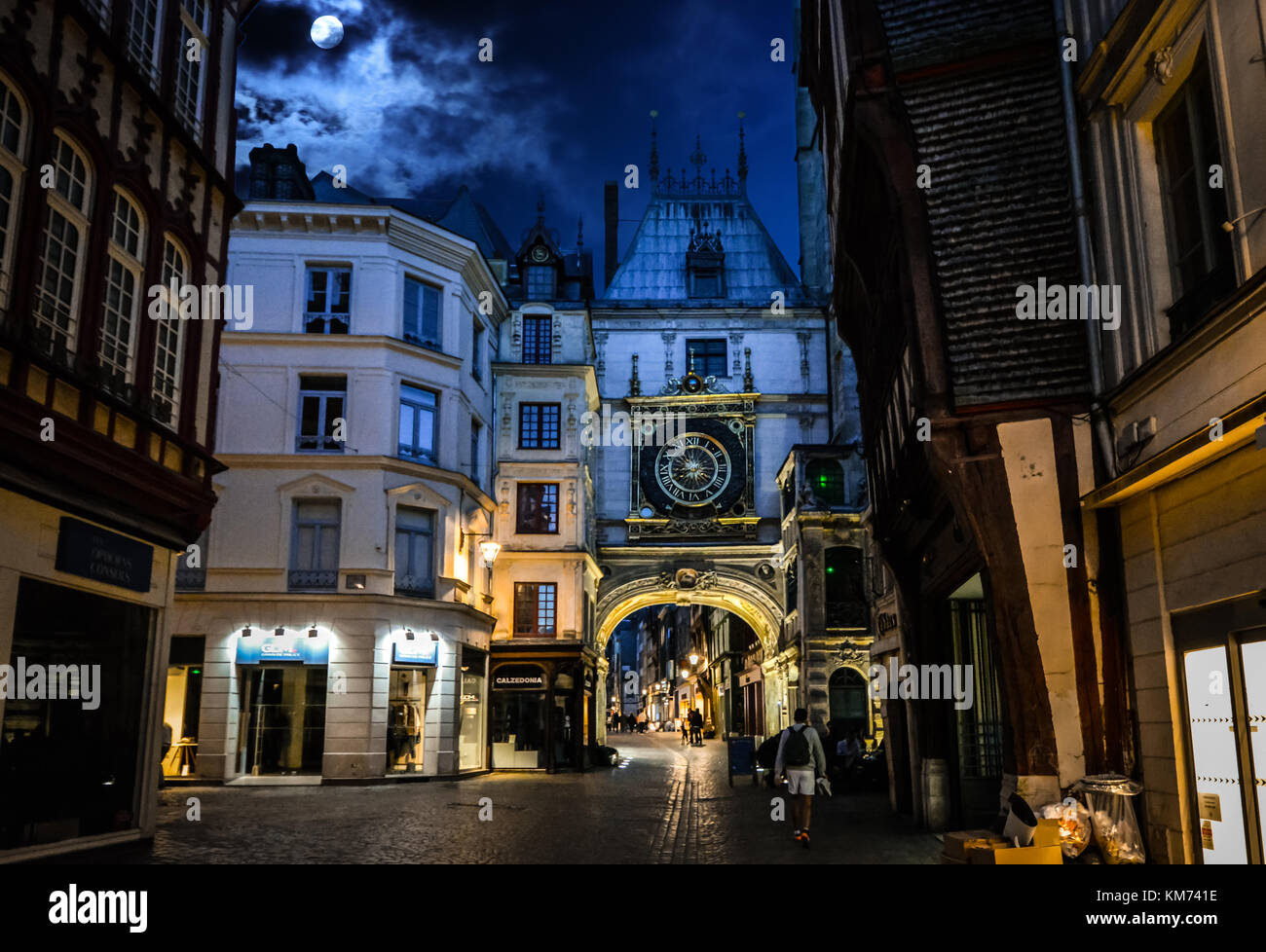 The historic astronomical clock, gros horlage in the medieval city of Rouen France in the Normandy Region. Taken at night with a full moon Stock Photo