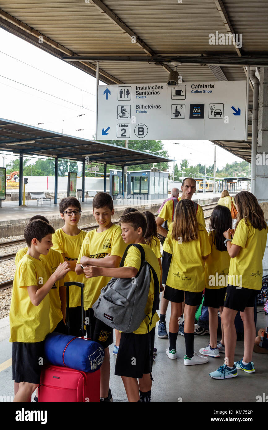 Coimbra Portugal,Coimbra B,Comboios de Portugal,railway,train,station,platform,boy boys,male kid kids child children youngster youngsters youth youths Stock Photo