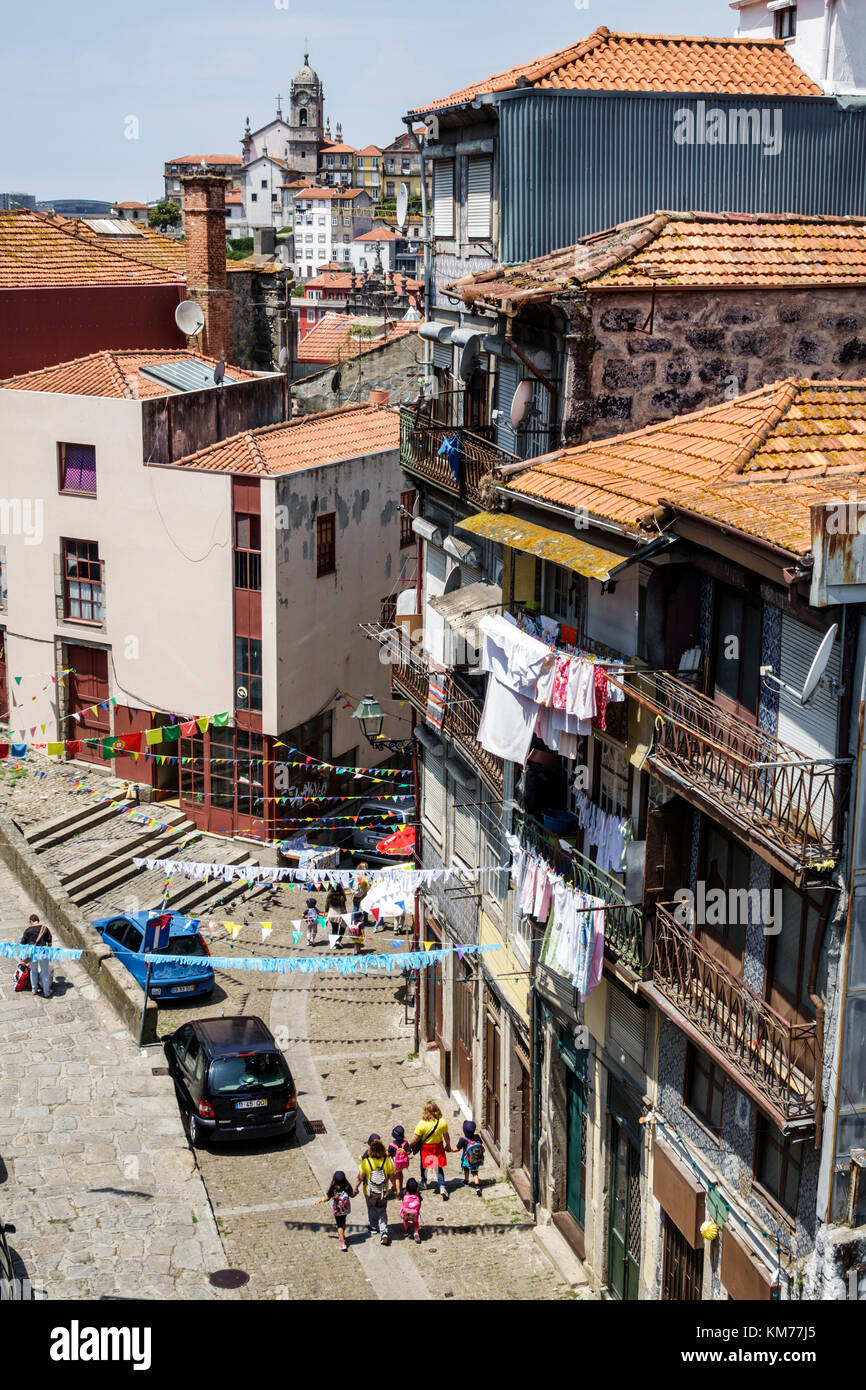 Porto Portugal,Baixa,residential apartment building,city skyline,rooftops,ceramic tiles,historic center,buildings,street,balcony,overhead view,clothes Stock Photo