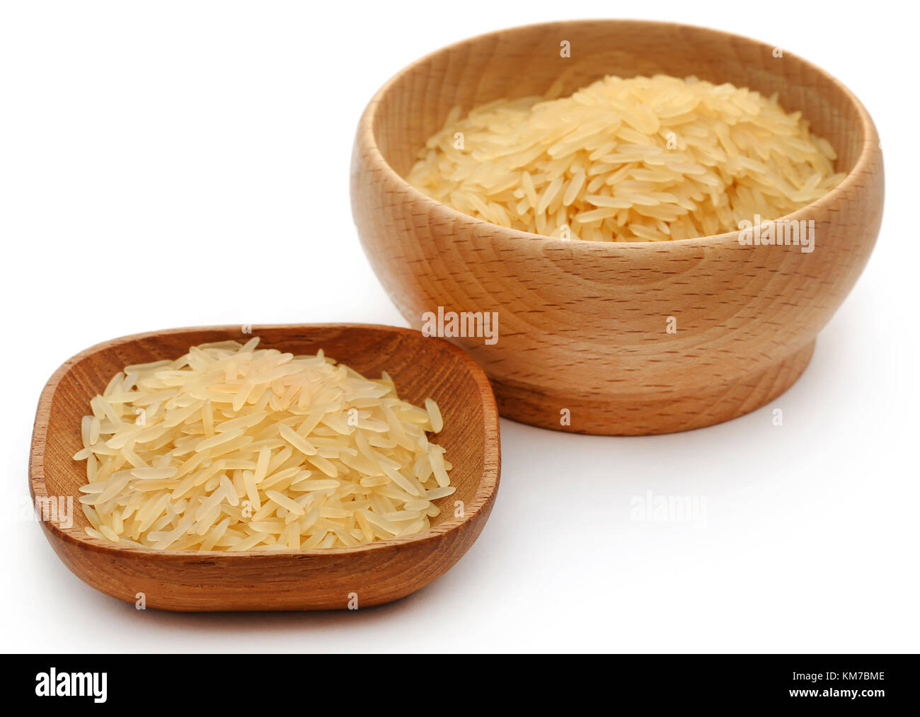 Basmati rice in bowl over white background Stock Photo