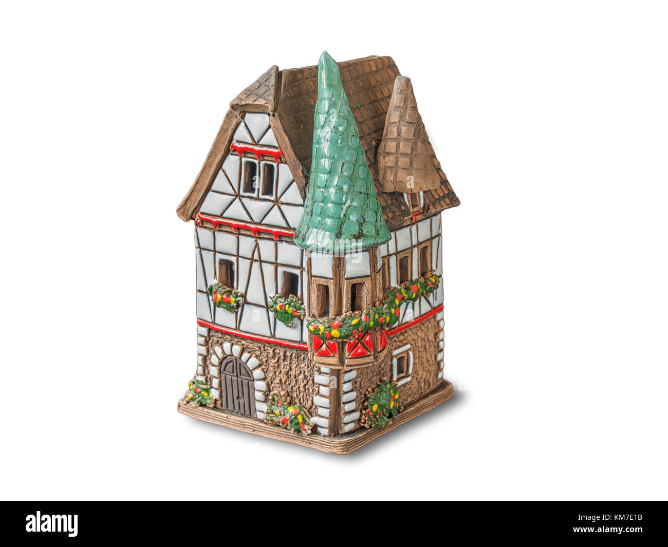 Christmas fairy clay candle house isolated on white Stock Photo