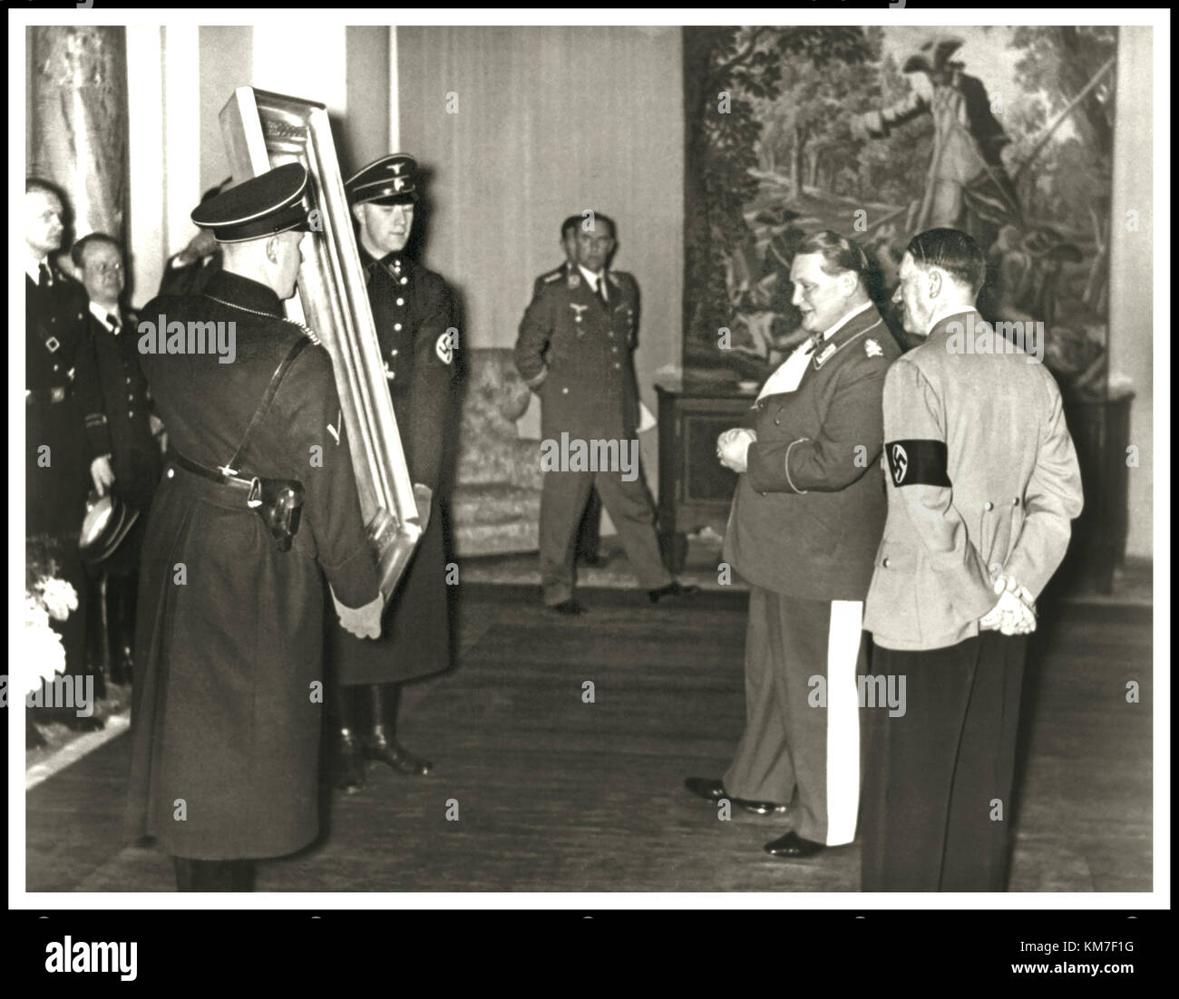 VINTAGE NAZI GOERING BIRTHDAY HITLER German Field-Marshal Hermann Goering presented with a painting named ''The Falconer' on his 45th birthday given to him by by Adolf Hitler Stock Photo