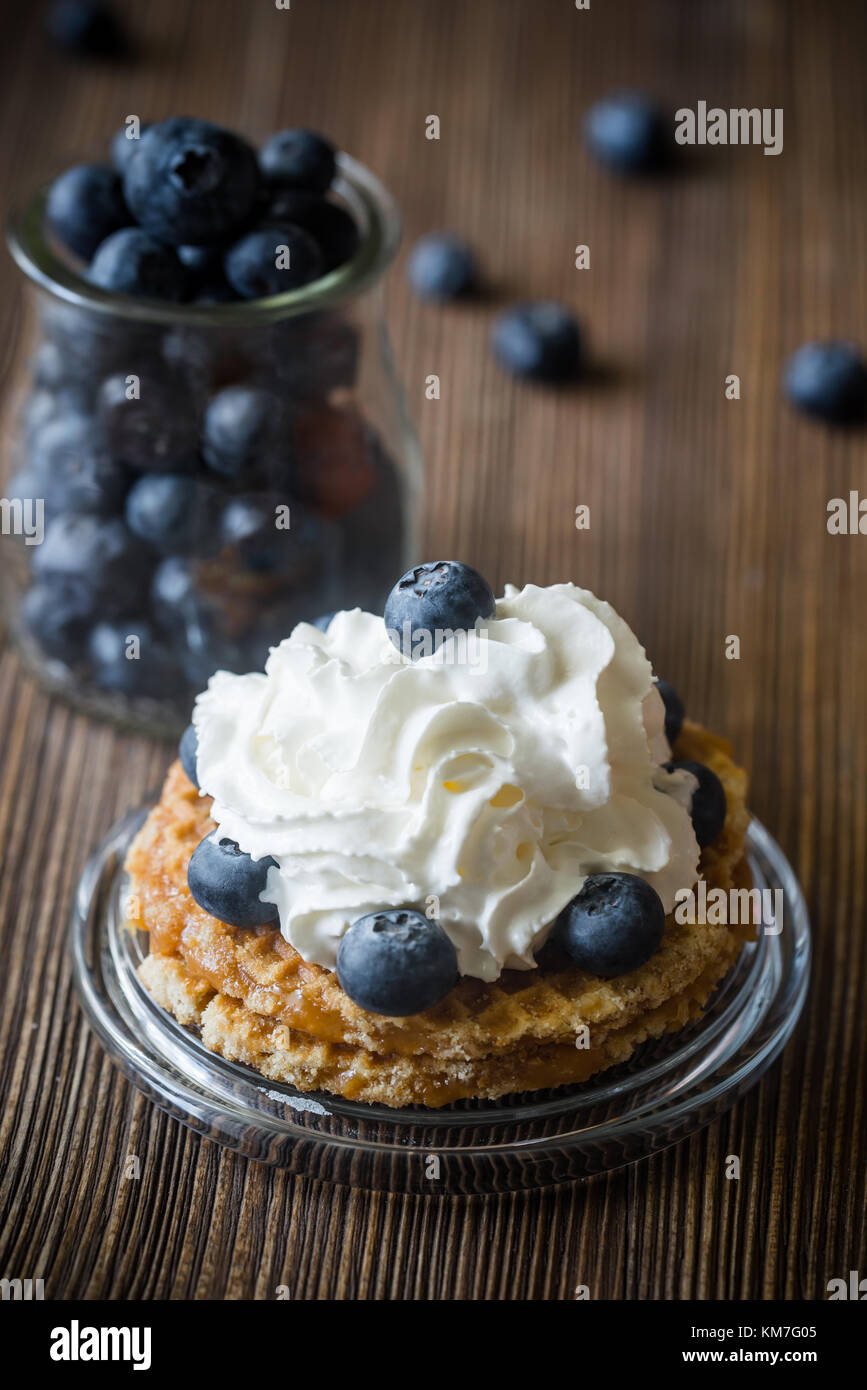 Waffle with whipped cream and fresh berries Stock Photo - Alamy