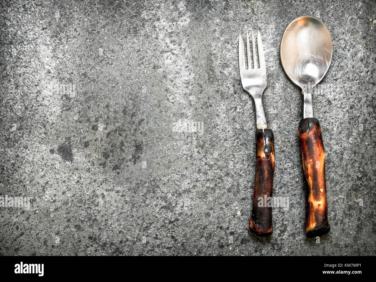 Serving background. Cutlery. On the rustic background Stock Photo - Alamy