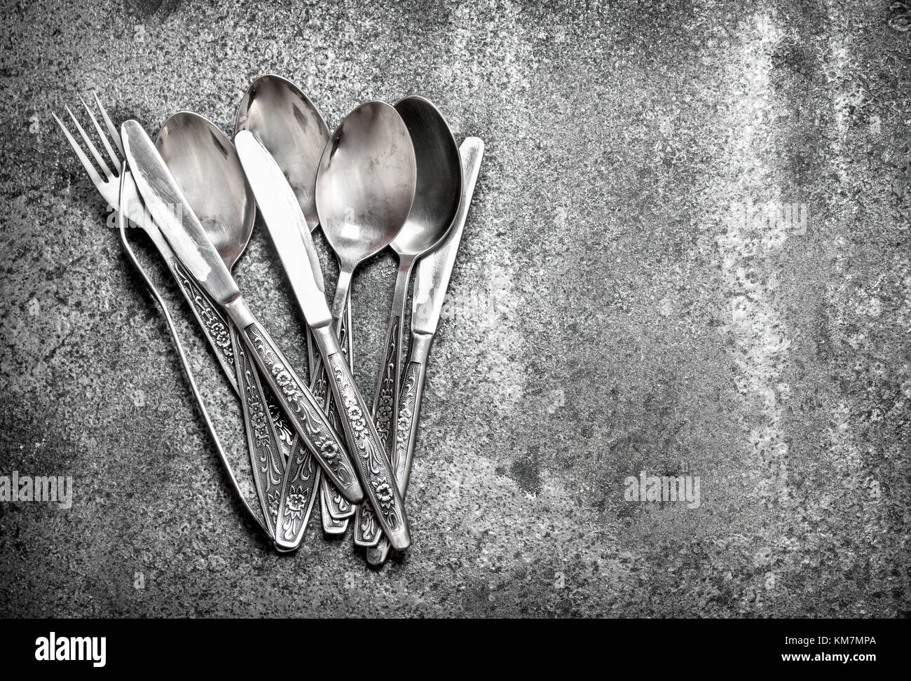 Serving background. Cutlery. On the rustic background Stock Photo - Alamy