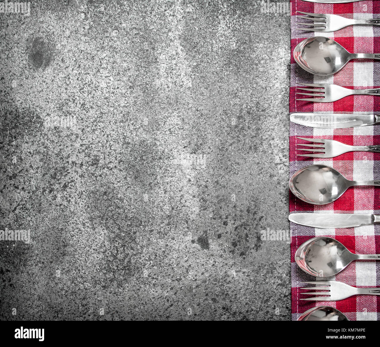 Serving background. Cutlery on a napkin. On rustic background Stock ...