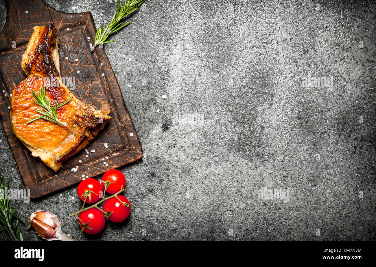 Meat grill. Fried piece of meat with spices on a rustic background ...