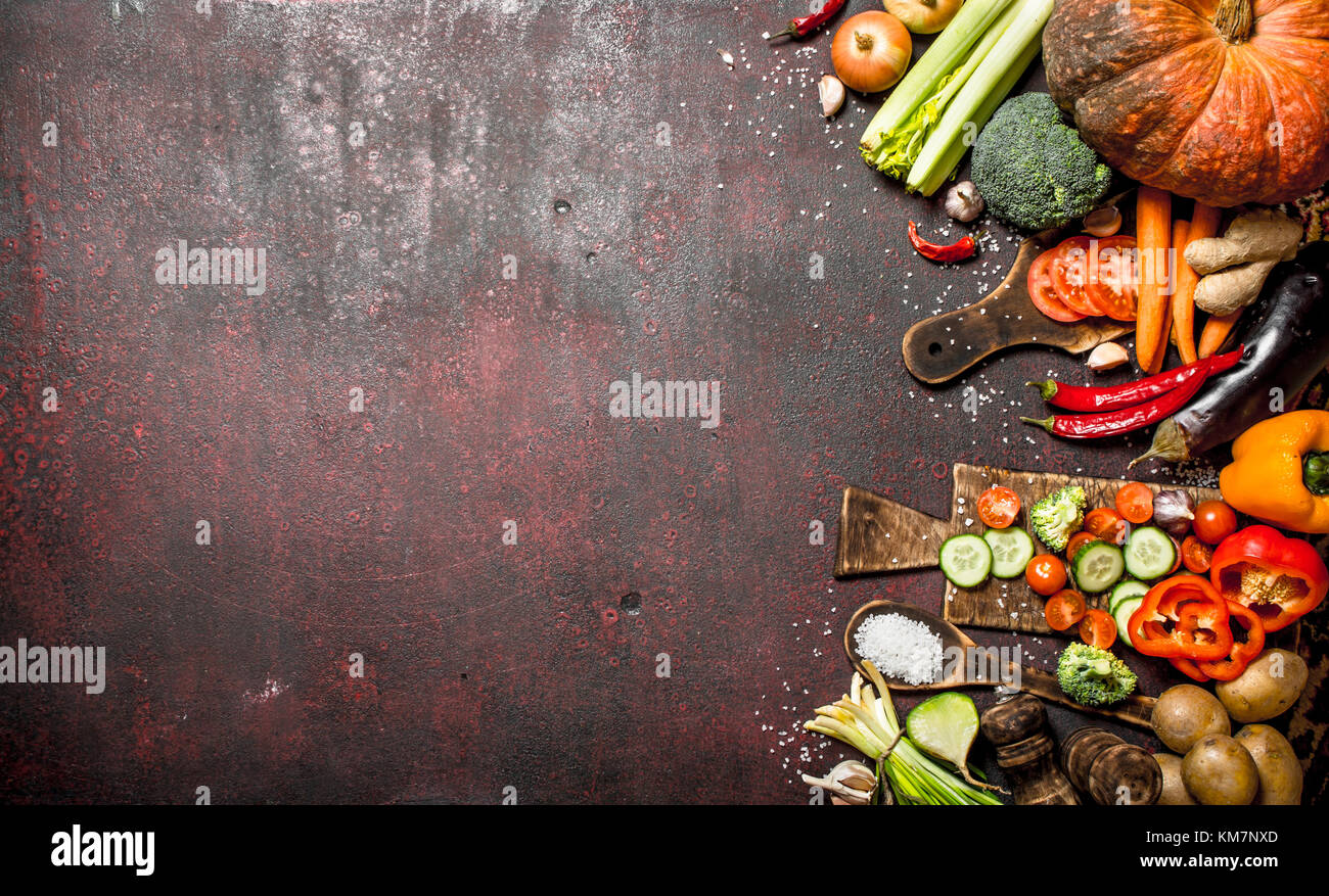 Organic Food. A variety of fresh vegetables. On rustic background Stock ...