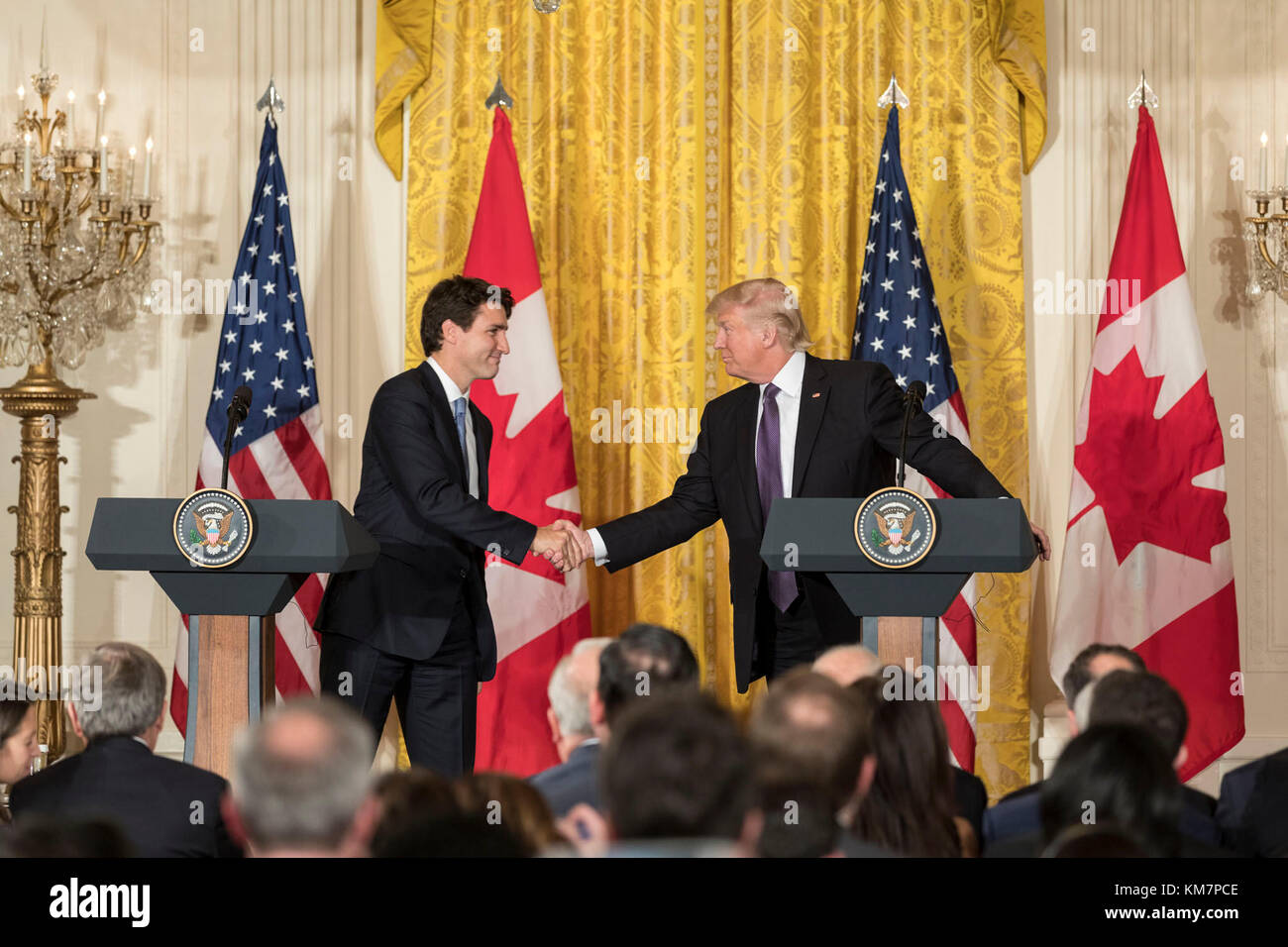 President Donald Trump and Canadian Prime Minister Justin Trudeau shake hands during a joint press conference, Monday, Feb. 13, 2017, in the East Room of the White House. (Official White House Photo by Shealah Craighead) Stock Photo