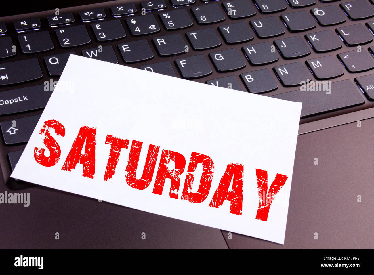 Writing Saturday text made in the office close-up on laptop computer ...