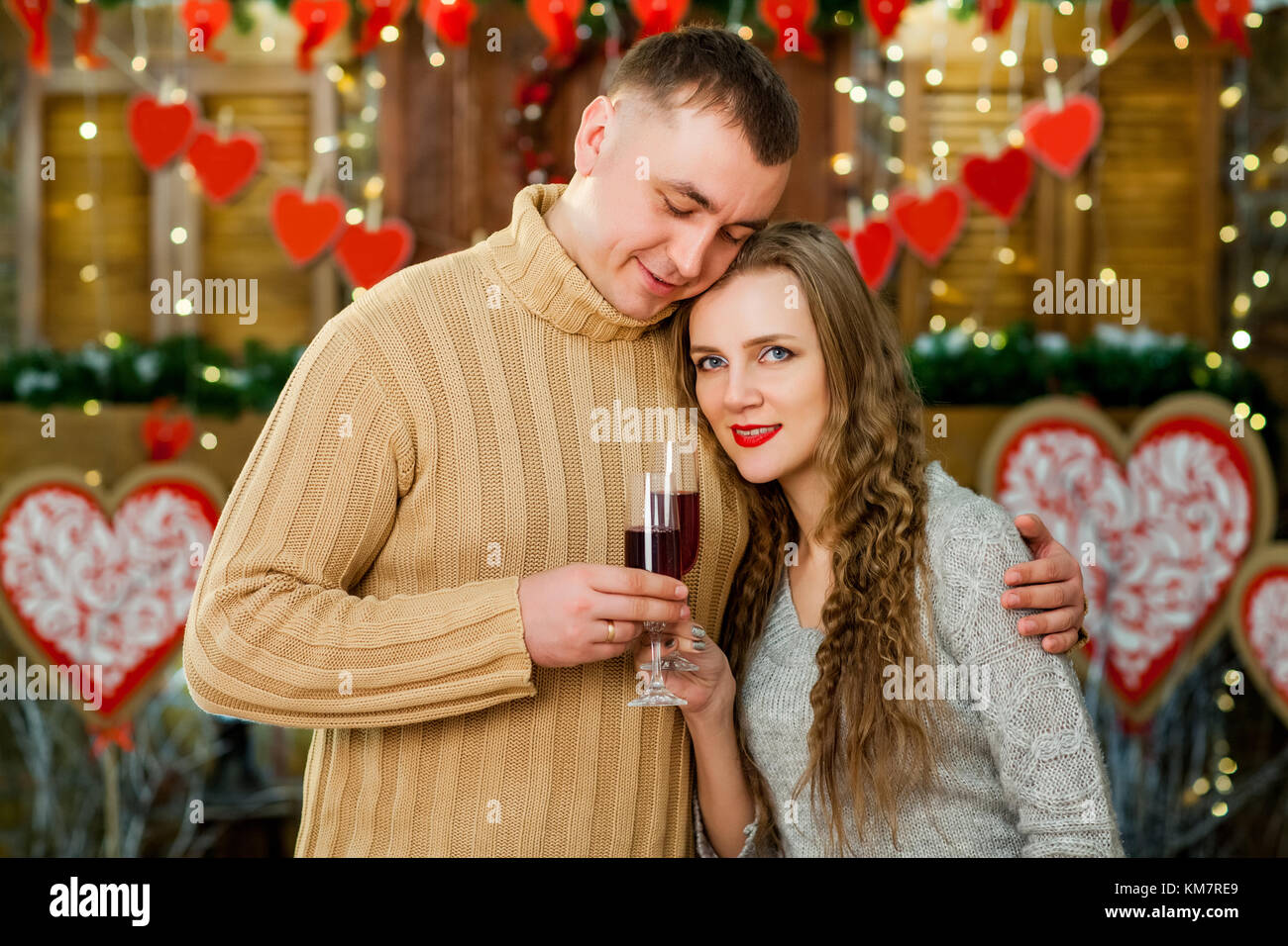 Husband and wife drinking wine on valentine's day Stock Photo - Alamy