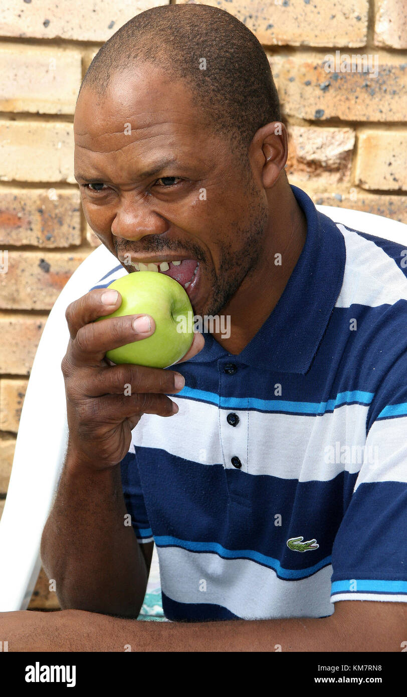 Black Person Eating Fruit