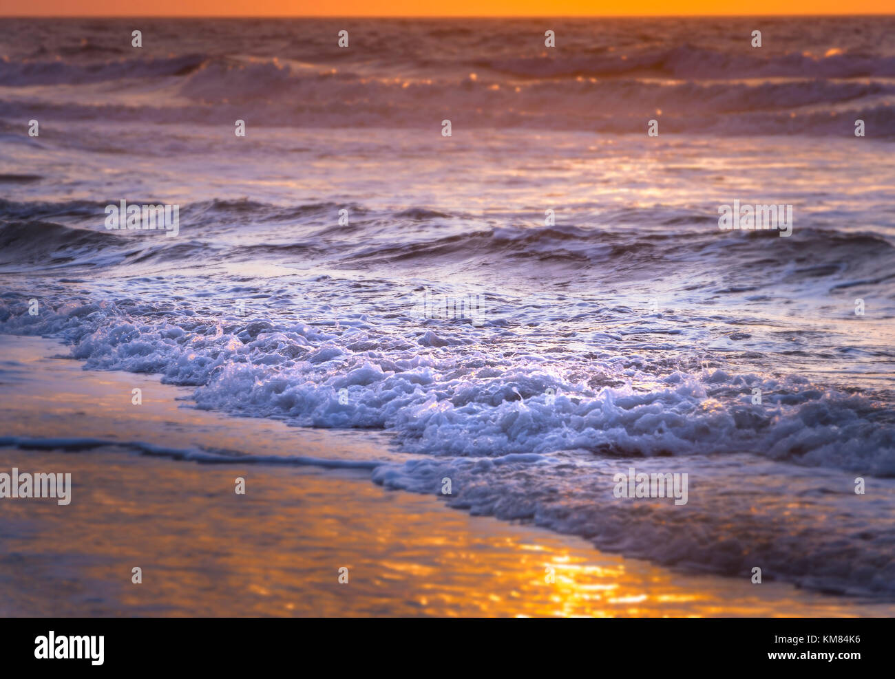 Ocean Waves At Hilton Head Beach At Sunrise, South Carolina, USA Stock Photo