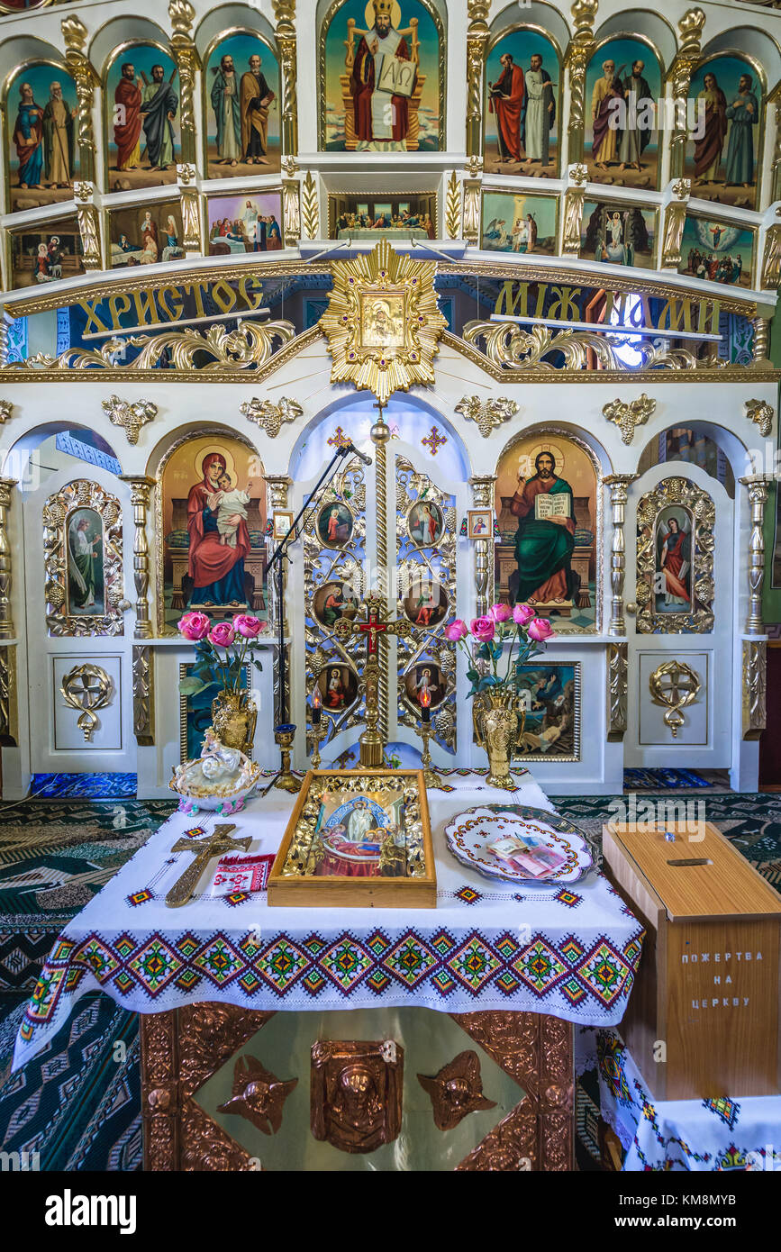 Iconostases in Wooden Orthodox Church of the Assumption of the Blessed Virgin, former Catholic church in Chortkiv city in Ternopil Oblast of Ukraine Stock Photo