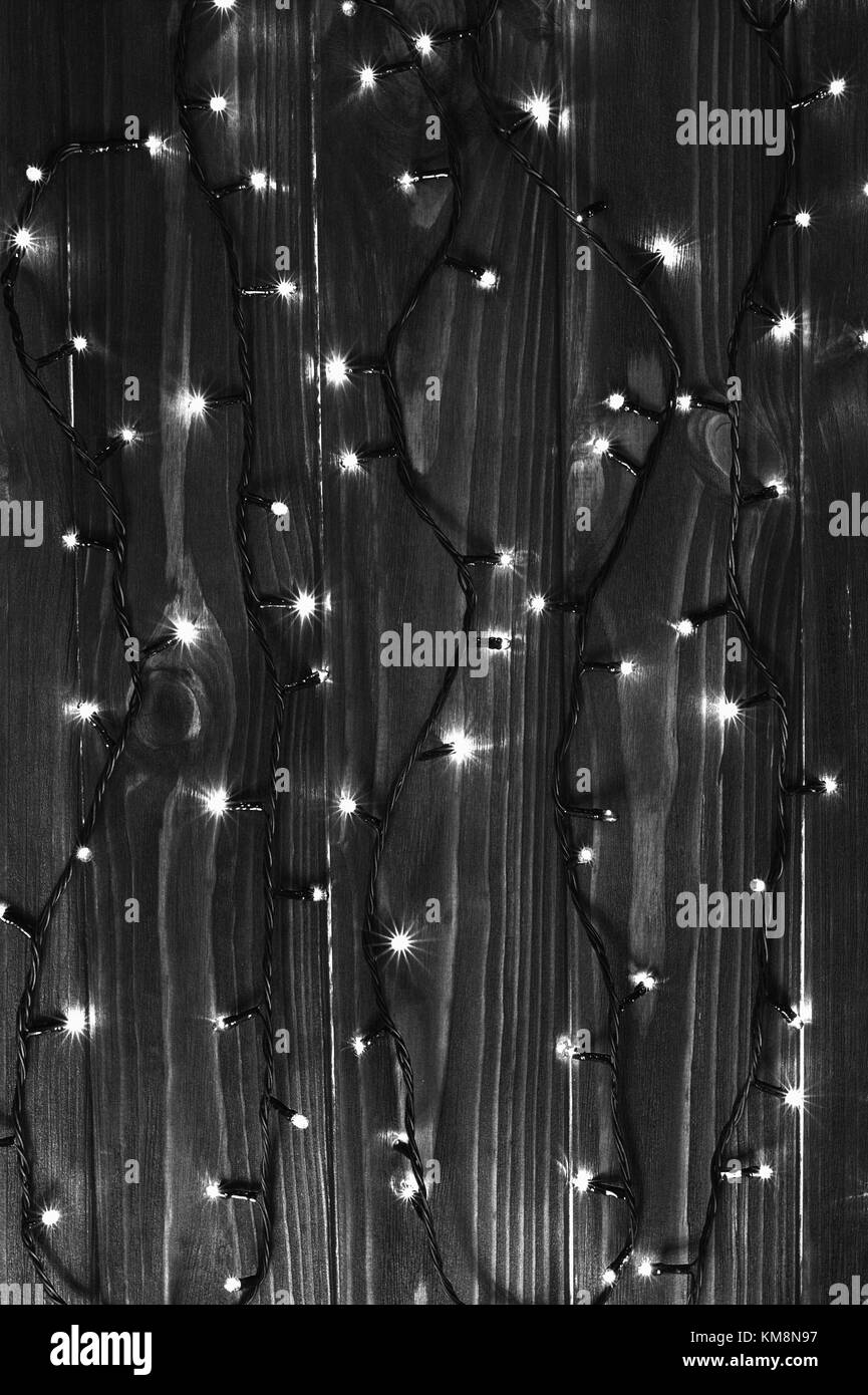 Christmas lights black and white effect background Stock Photo - Alamy