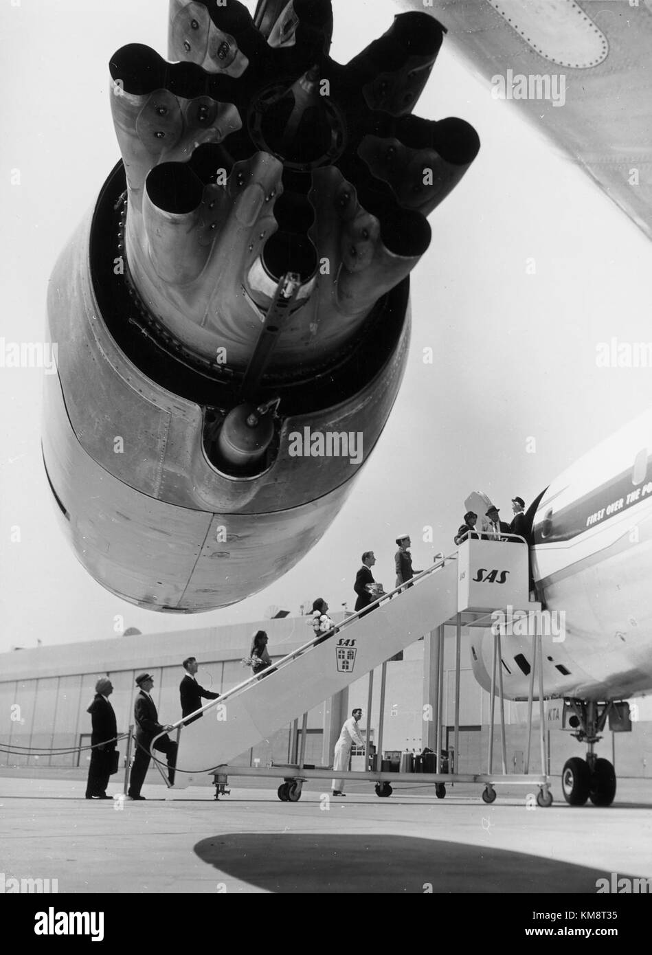 SAS DC 8 33, turbofan engine. Passengers boarding the aircraft, stair case Stock Photo