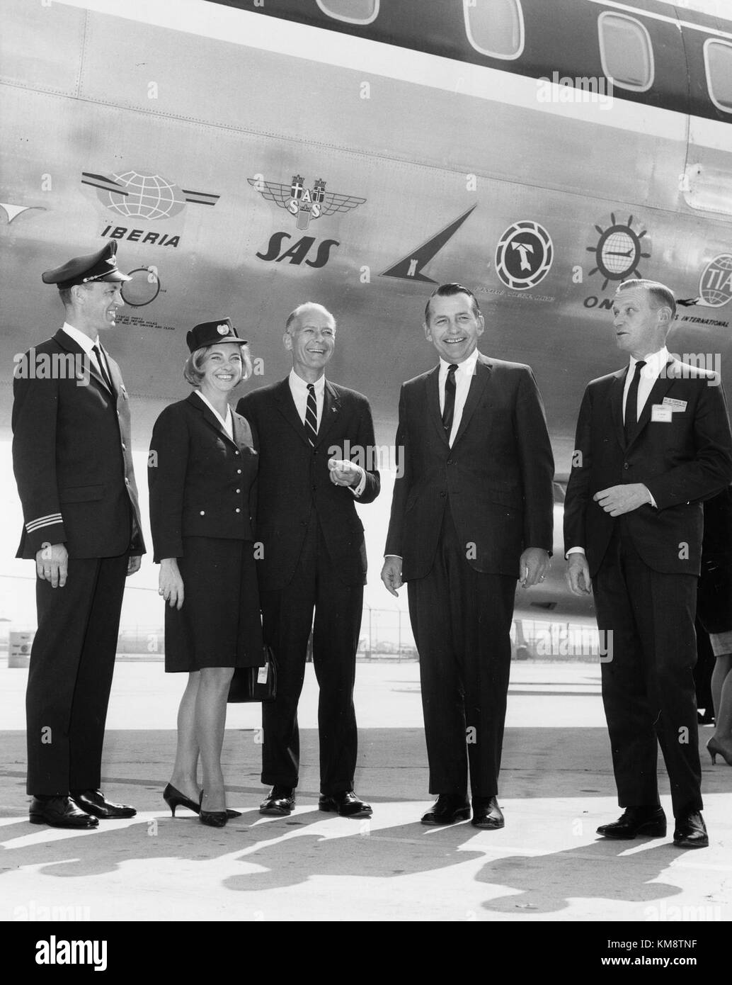 Photograph of the roll-out ceremony for the SAS DC-8 63 at the Douglas Company in Long Beach, California. The ceremony marks the completion of this aircraft model, a significant milestone in aviation history. Stock Photo