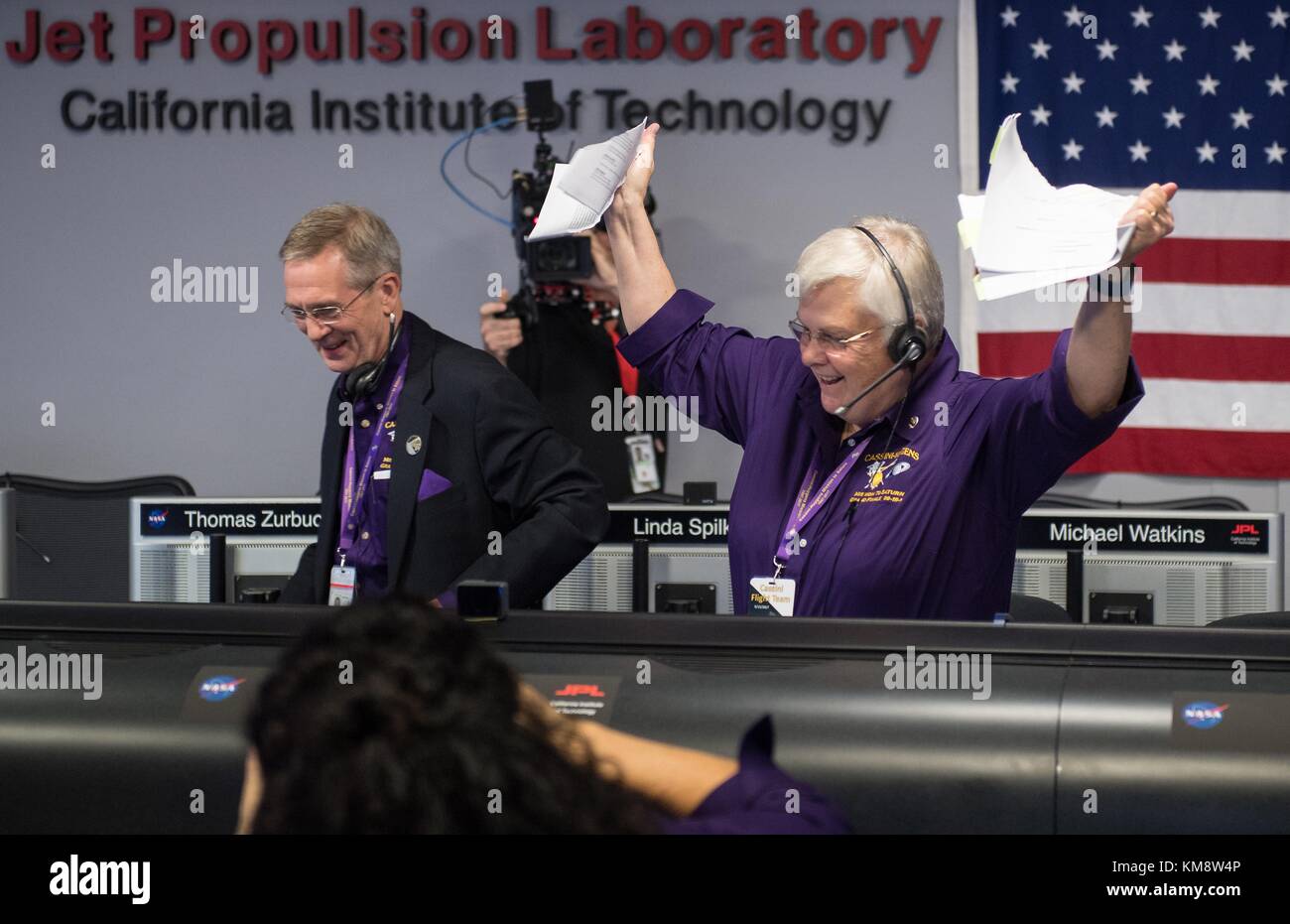 Cassini Mission Spacecraft Operations Team Manager Julie Webster rips up the final contingency plan for the Cassini mission as the Cassini spacecraft makes its final plunge into Saturn during the end of the Cassini-Huygens mission at the NASA Jet Propulsion Laboratory September 15, 2017 in Pasadena, California.  (photo by Joel Kowsky  via Planetpix) Stock Photo