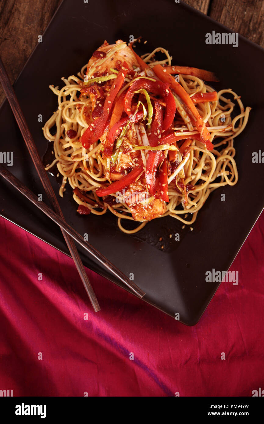 chinese style salmon fillet with noodles Stock Photo - Alamy