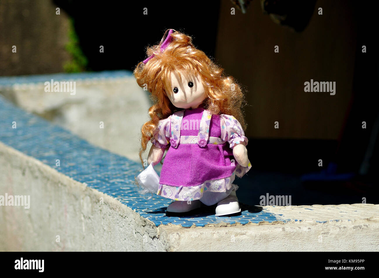 lovelorn toy girl Stock Photo