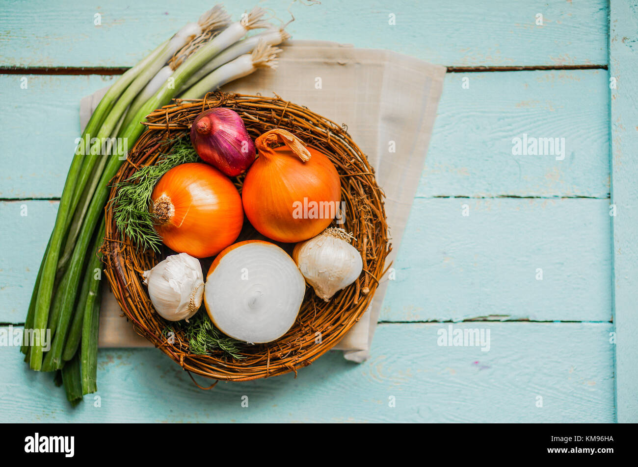 Golden Onions On Rustic Wooden Background Stock Photo - Alamy