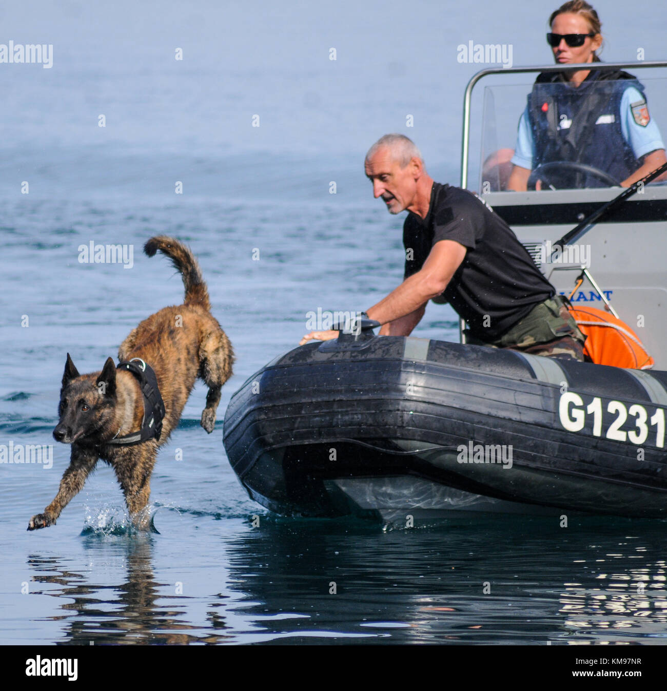 French and swiss gendarmes take part in a lifesize drill at Leman lake, Savoie, France Stock Photo