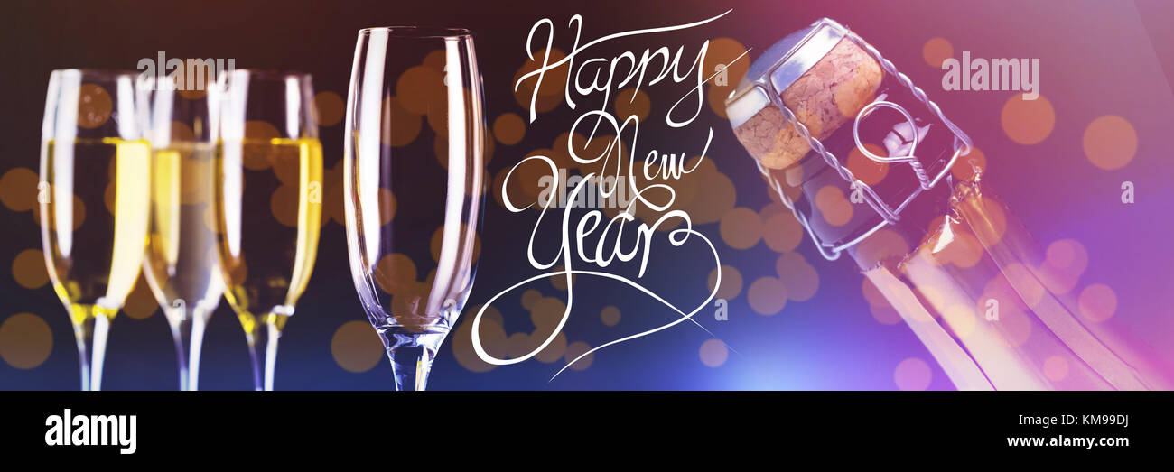 Happy New Year message against three full glasses of champagne and one ...