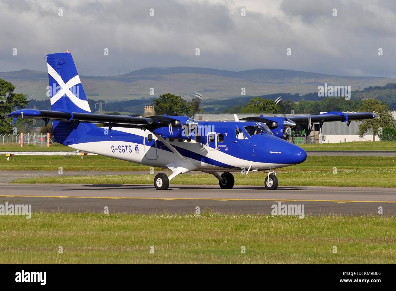 G-SGTS DHC-6-400 TWIN OTTER OF THE SCOTTISH GOVERNMENT AND OPERATED BY LOGANAIR. Stock Photo