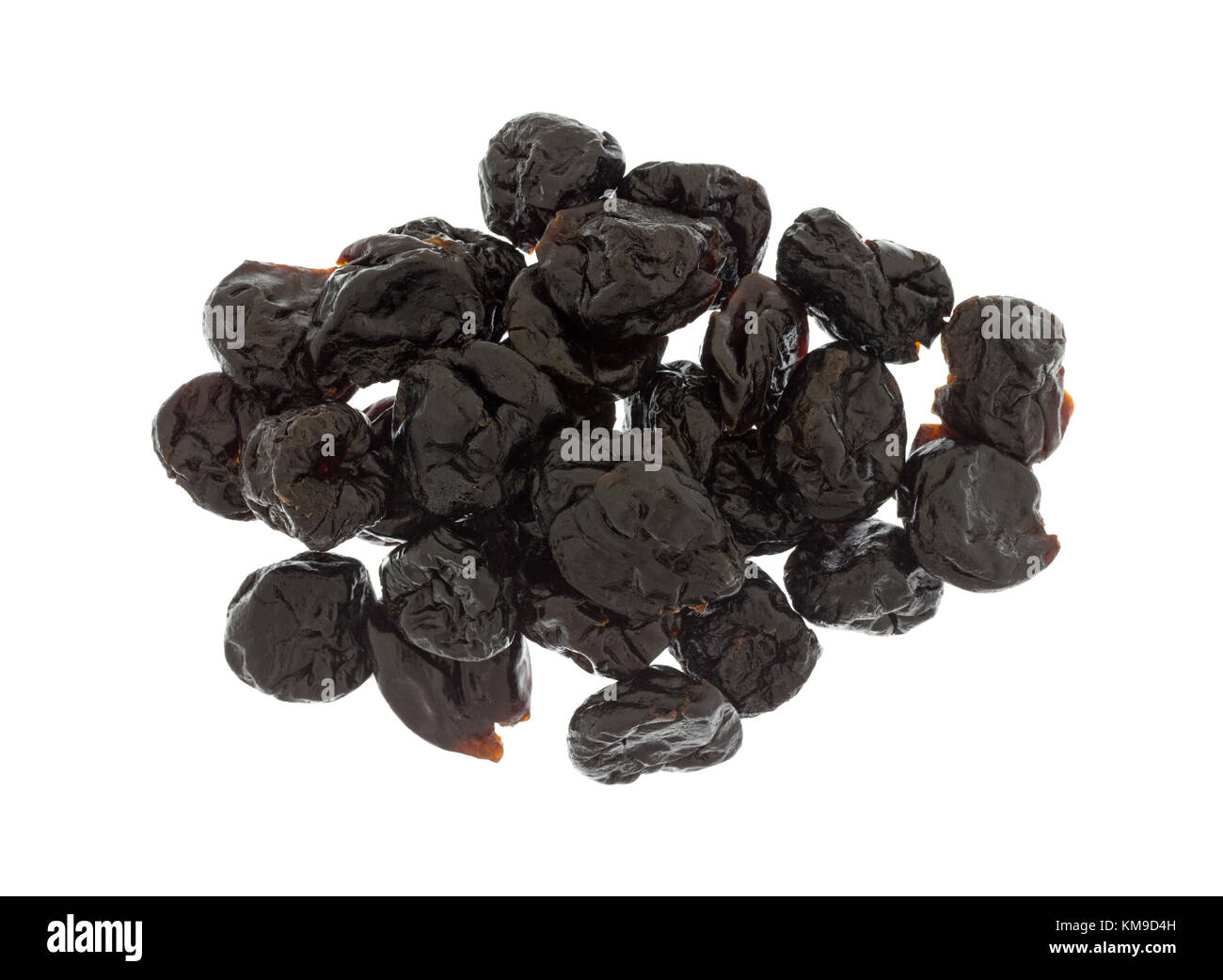 Top view of a portion of dried bing cherries isolated on a white