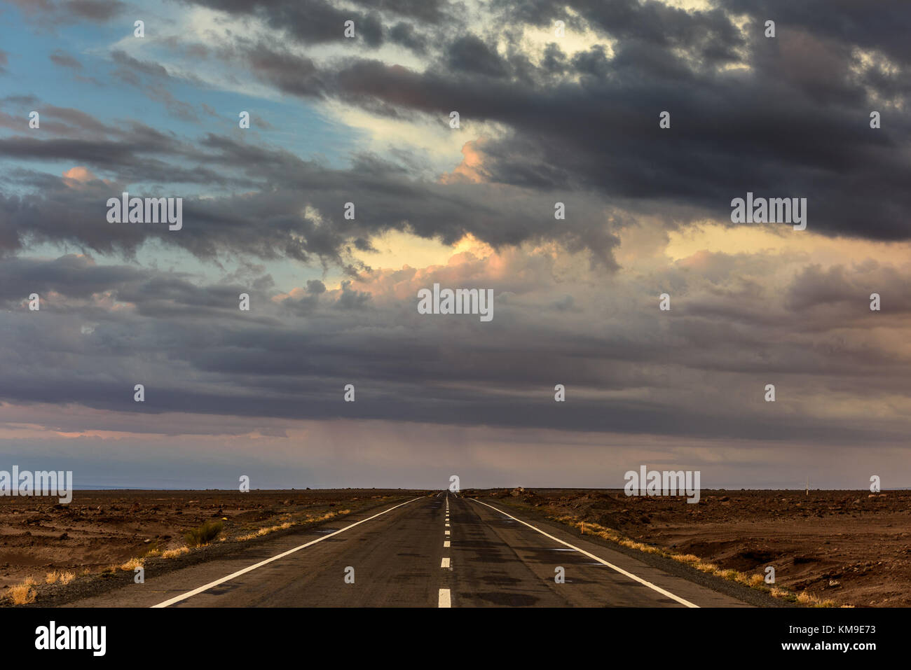 Straight road though the Atacama Desert, Chile Stock Photo