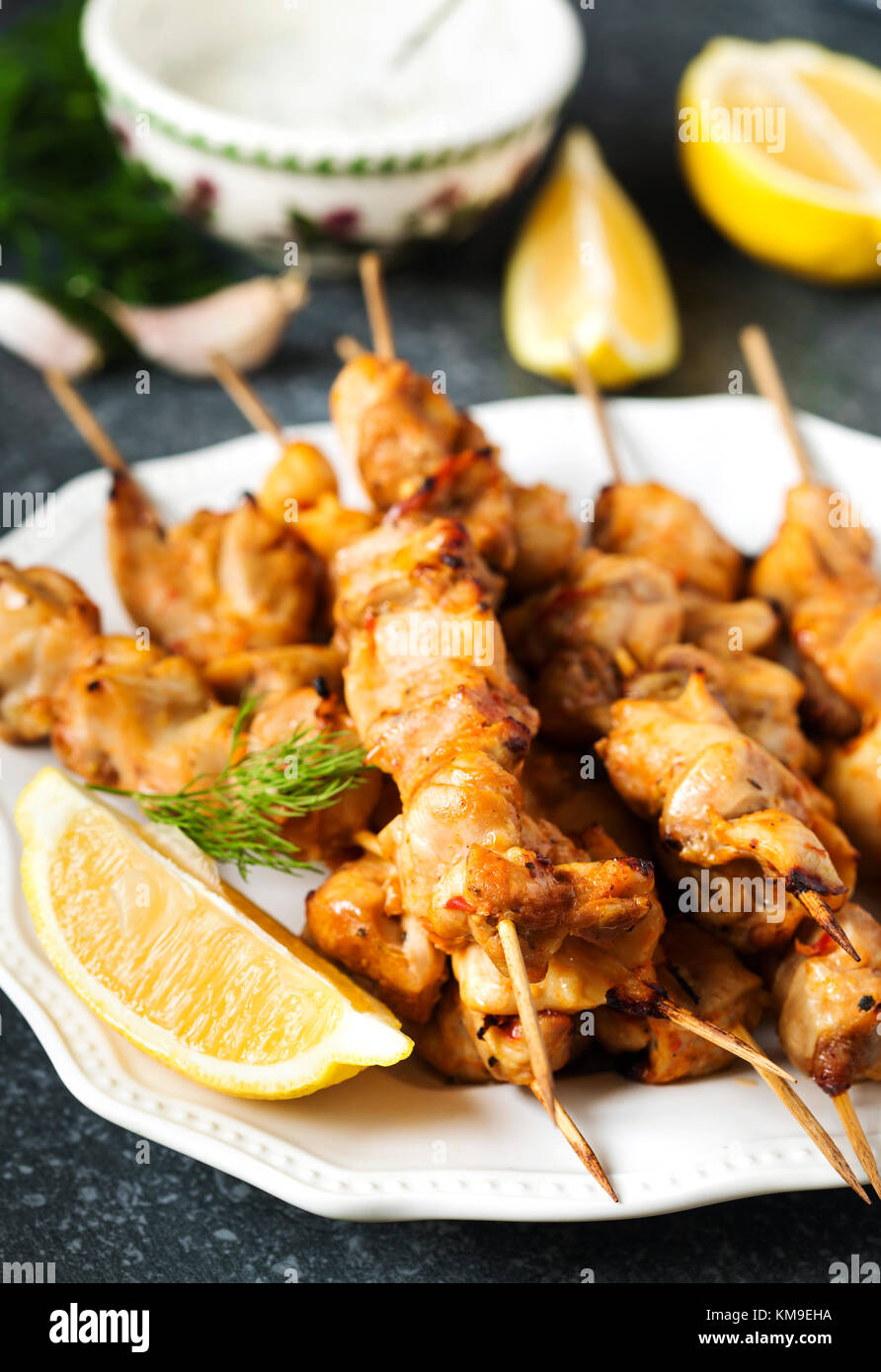 Marinated Chicken skewers with lemon and yogurt dressing Stock Photo