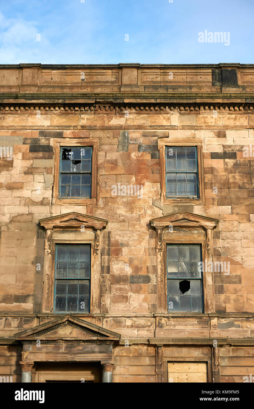 Glasgow, Scottland - 1 December 2017: An old neglected building in the city centre awaiting demolition and redevelopment. Stock Photo