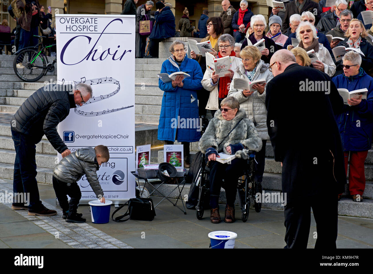 Choir raising money for Overgate Hospice, in the Piece Hall, Halifax, West yorkshire UK Stock Photo