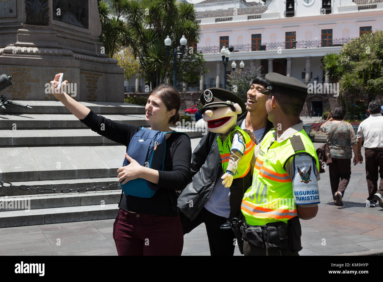 Qutio Ecuador - tourist taking a selfie with the local police, Quito, Ecuador South America Stock Photo