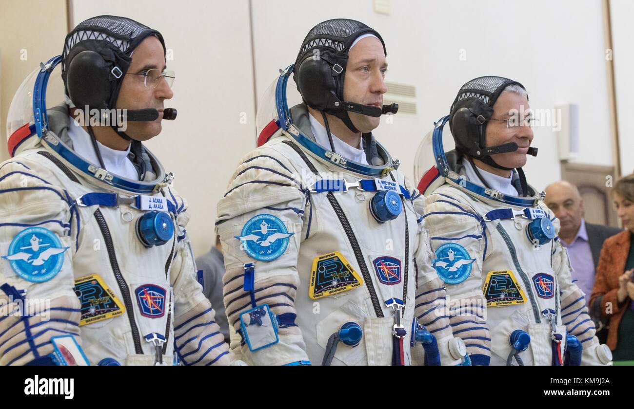 NASA International Space Station (ISS) Expedition 53 prime crew members (L-R) American astronaut Joe Acaba, Russian cosmonaut Alexander Misurkin of Roscosmos, and American astronaut Mark Vande Hei prepare to start their pre-launch Soyuz qualification exams in their Sokol launch and entry spacesuits prior to the Soyuz MS-06 spacecraft launch at the Gagarin Cosmonaut Training Center August 31, 2017 in Star City, Russia.   (photo by Bill Ingalls  via Planetpix) Stock Photo